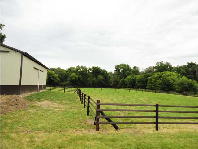 Flex Fence, Brown - Looking Up At A Corner Post